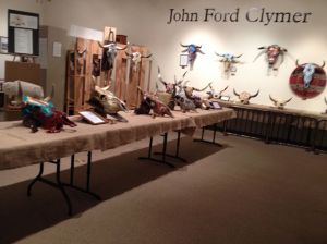 The Clymer Museum in Ellensburg featured an exhibit of decorated cattle skulls to be auctioned at the upcoming rodeo.